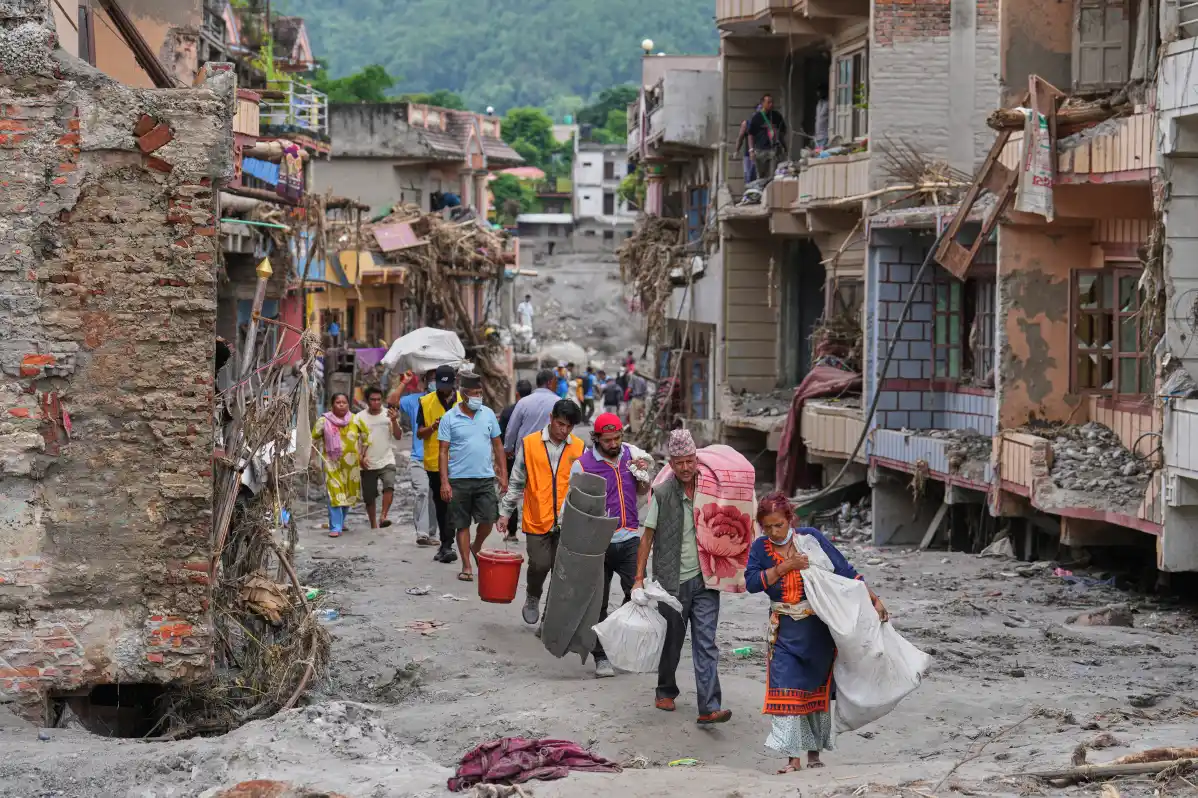 ‎Nepal Flood Disaster: Survivors Reach Safety as Families Await News of Thousands Missing