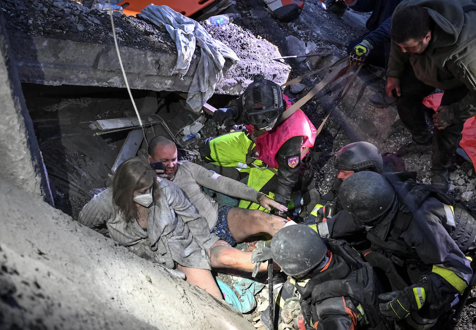 RUSSIAN STRIKES KILL 12 IN UKRAINE, INCLUDING THREE CHILDREN